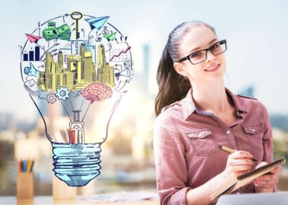 devojka drzi podsetnik i olovku u ruci i belezi sta sve treba uciti u buducnosti